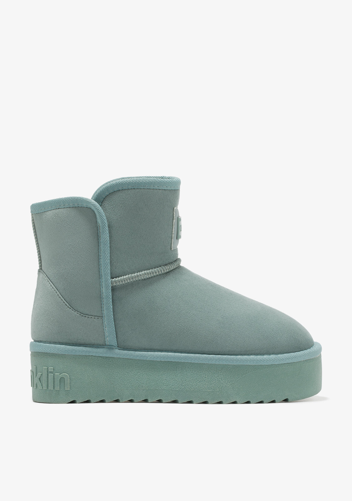 Green australian boot with platform